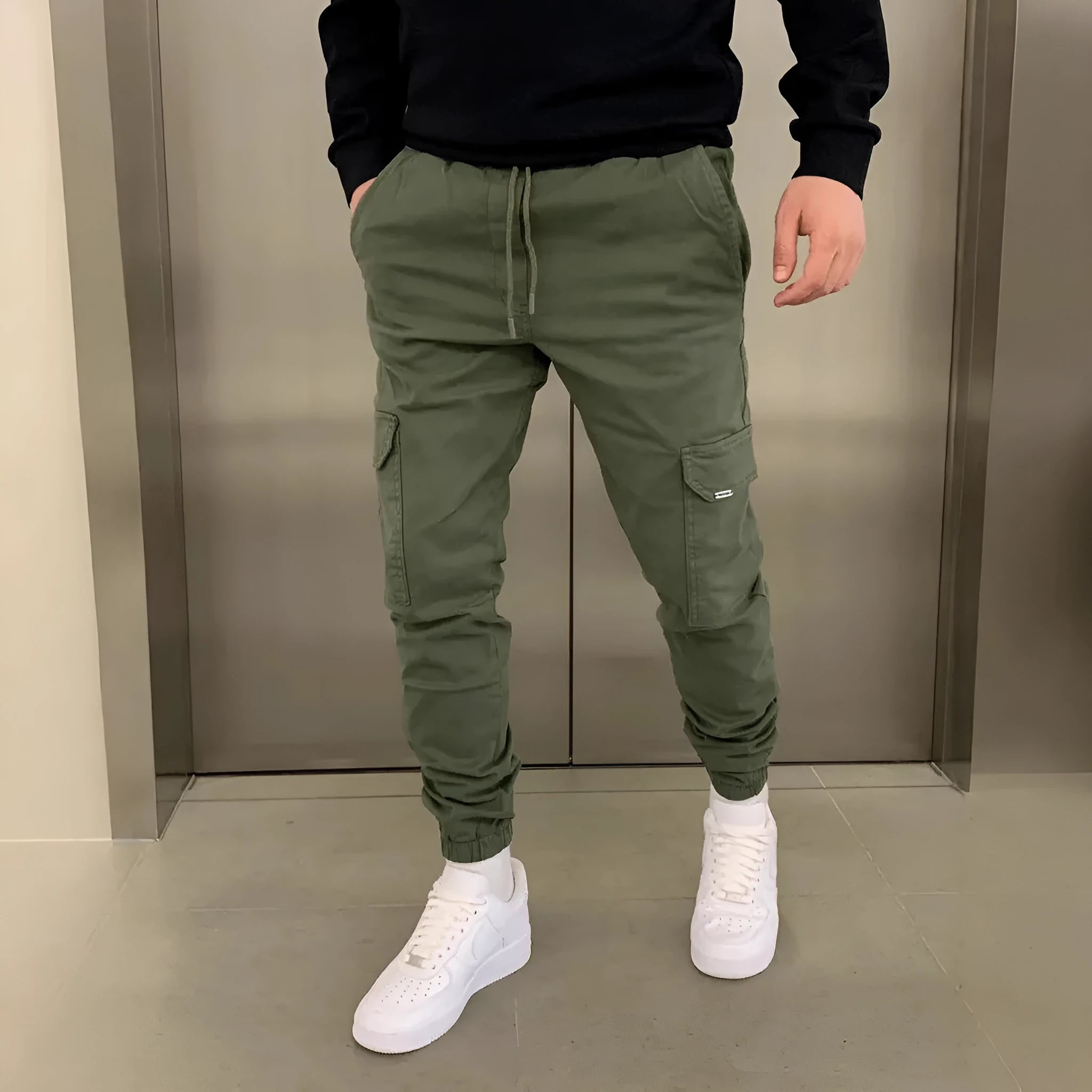 Men's loose fit casual trousers with dimensional patch pockets in light blue colour
