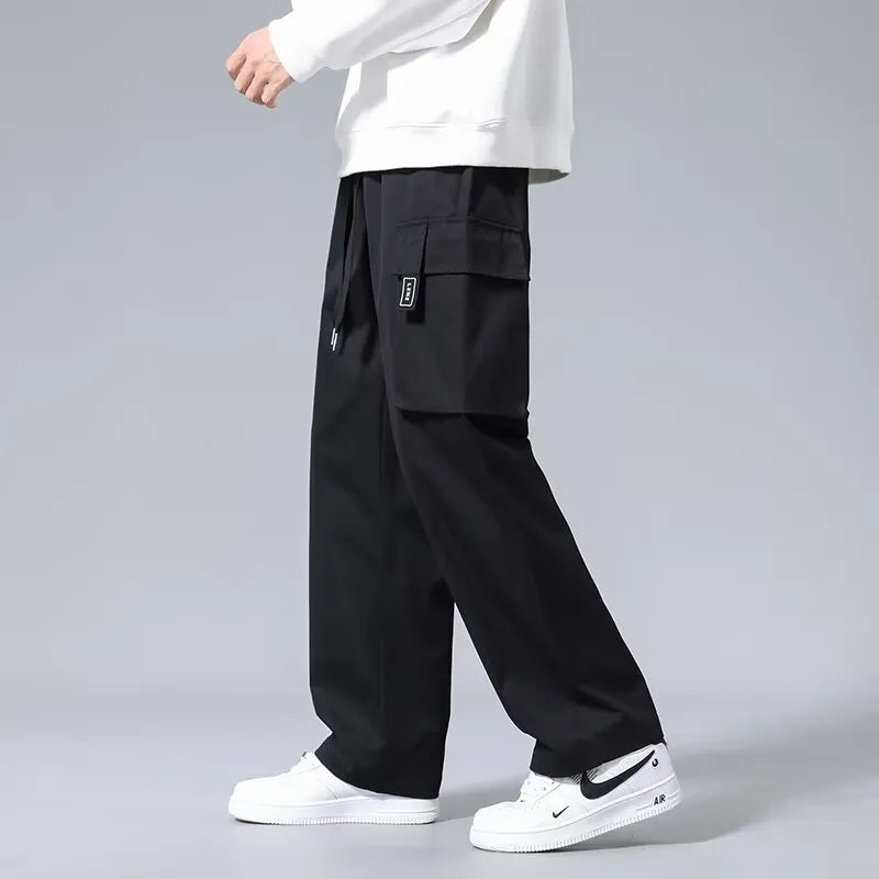 Boys straight leg cargo pants in Army Green with large pockets and a drawstring waist