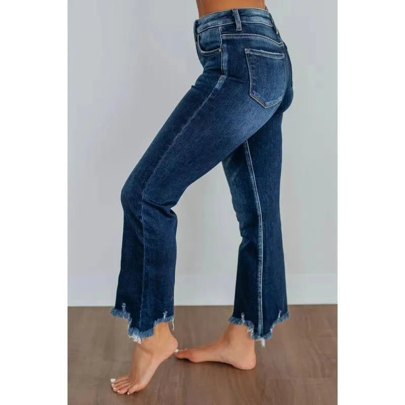 Women's casual denim pants with hand-worn distressing in dark blue or light blue solid colours
