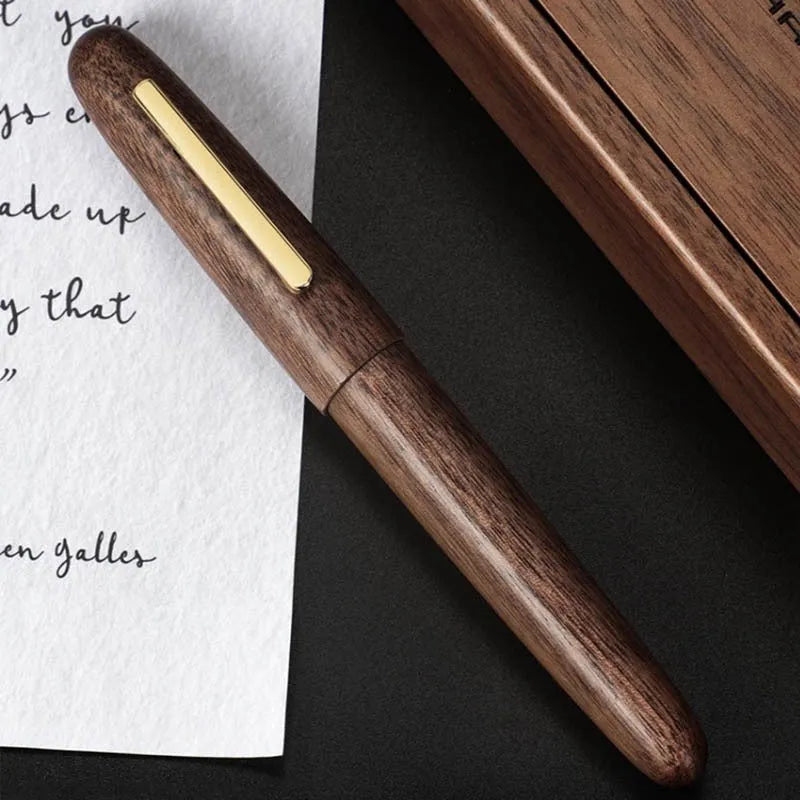 Wooden fountain pen with rotating cap in various wood finishes with interchangeable nib options
