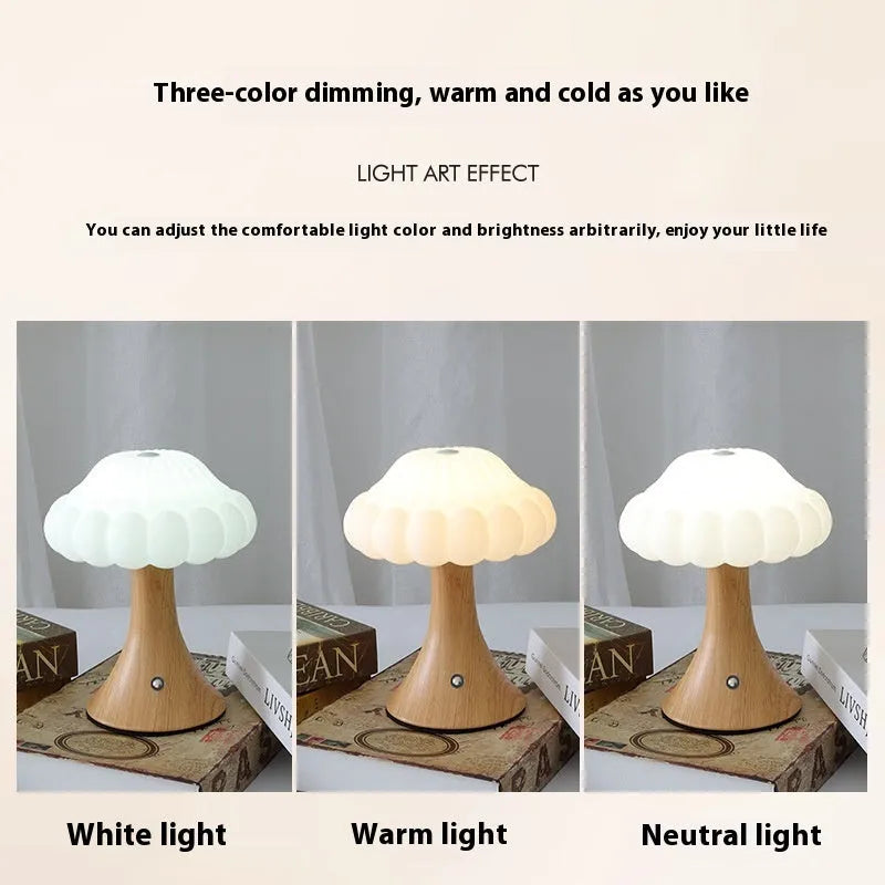 Small mushroom-shaped touch control night light in wood grain finish on a wooden table