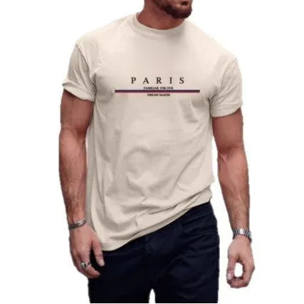 Man wearing a heavy loose-fit pure cotton T-shirt with a letter print on the chest in a casual setting.