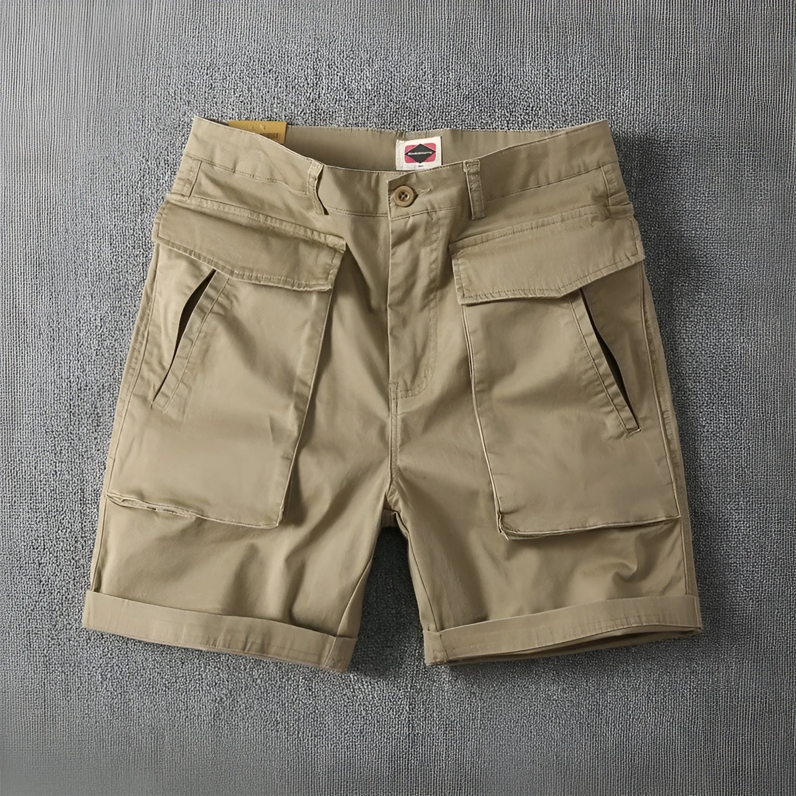 Men's army green cotton cargo shorts with multiple pockets, shown in a straight-leg summer street style.