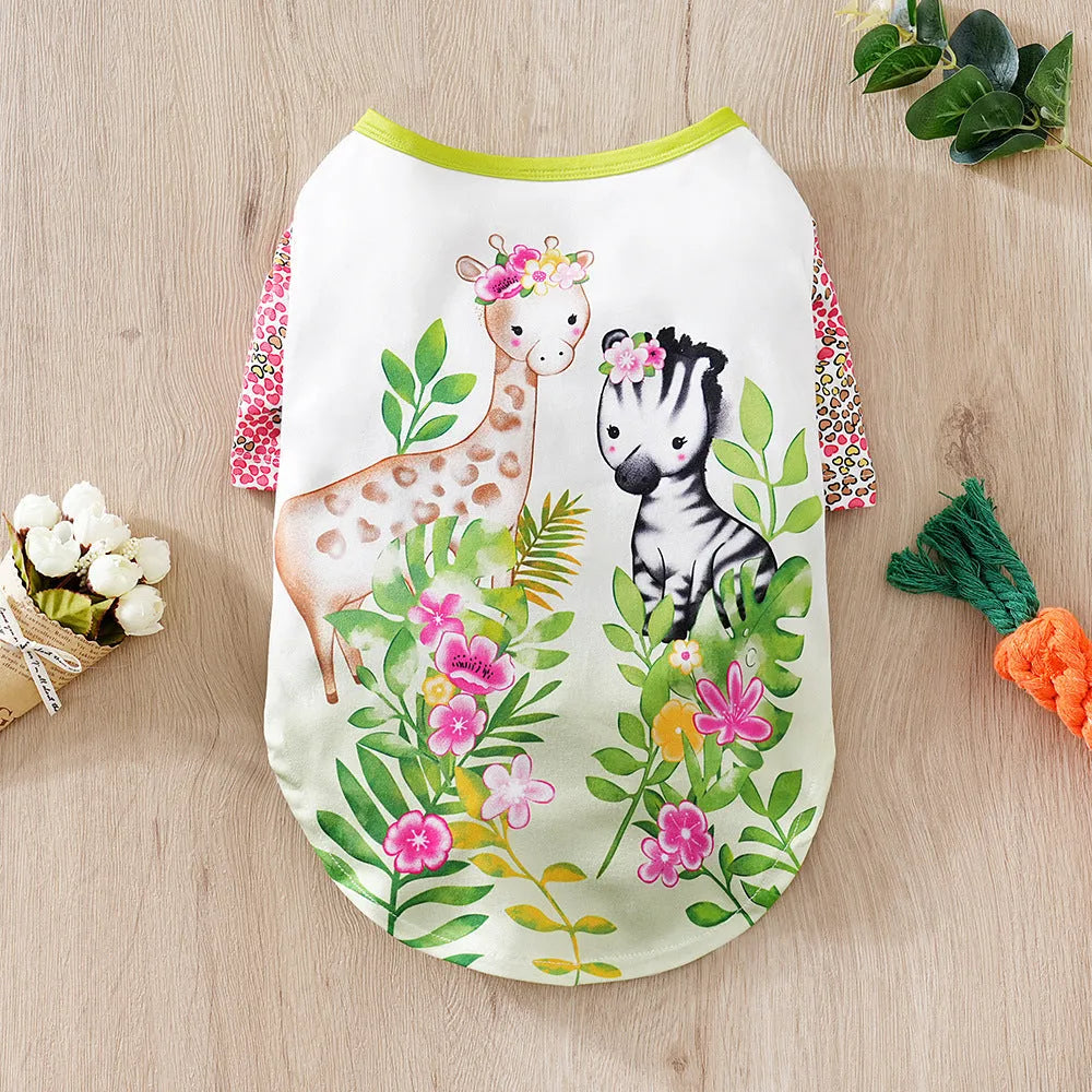 Full-print polyester t-shirt for a small dog, shown in one of six colour variants, with size chart for S, M, L, XL, XXL.