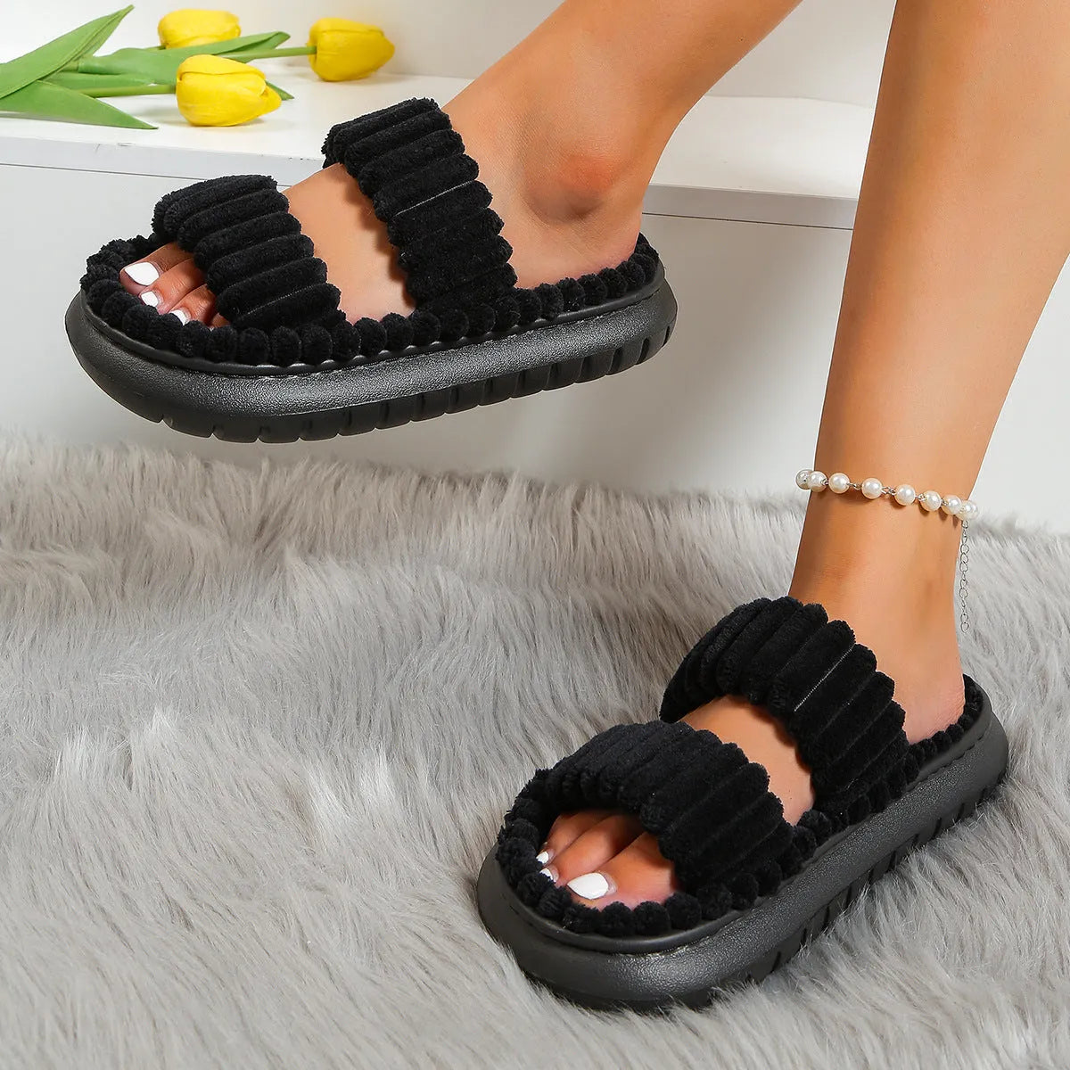 Soft lamb wool women's cotton slippers in black with plush upper and EVA sole
