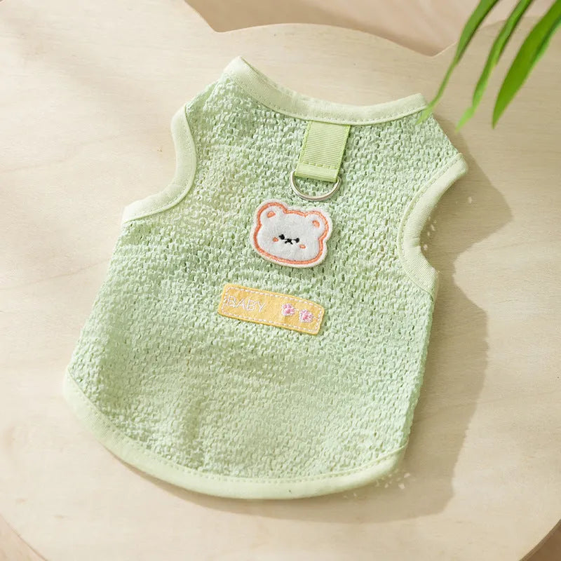 Green cat jumper with bear patch design showing breathable knitted fabric