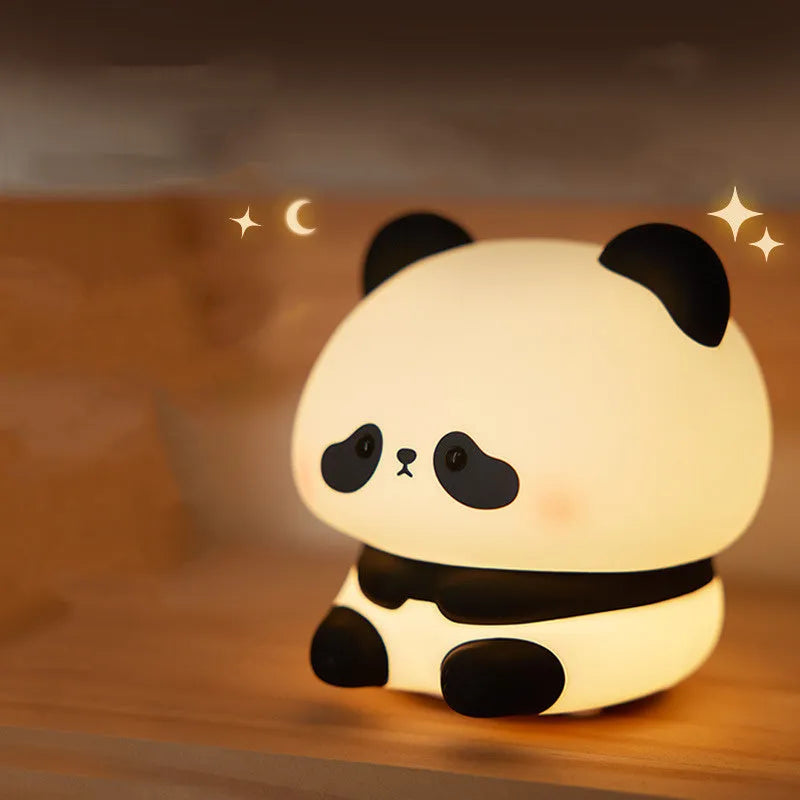 White panda-shaped night light with black accents measuring 150mm tall with USB charging port