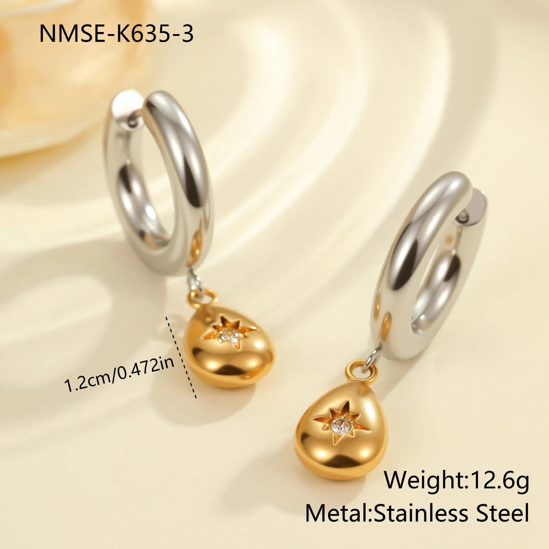 Gold Christmas tree earrings with heart and star shapes made from stainless steel with 18K plating