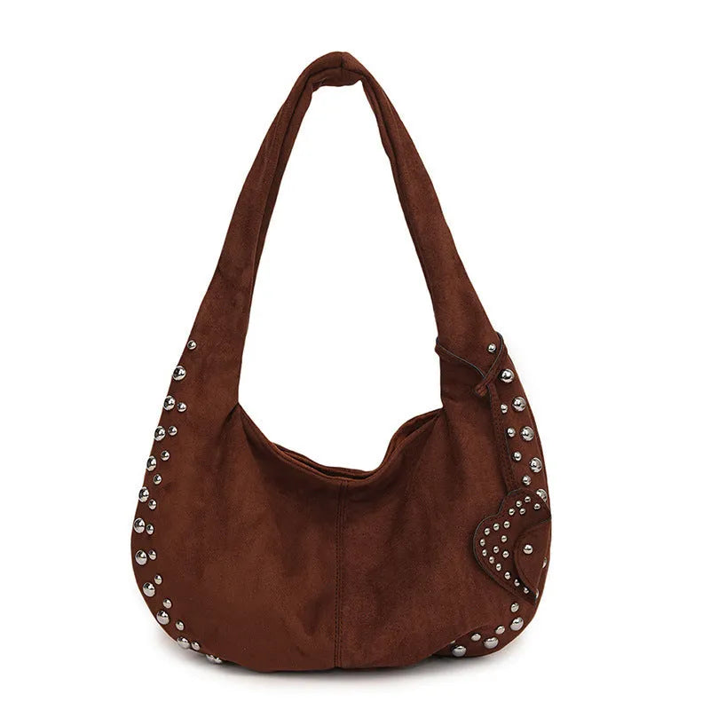 Soft plush retro tote handbag for women in a choice of colours, shown with strapless underarm carry.