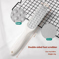 Stainless steel foot grinder with double-sided black and white sandpaper surfaces for callus removal