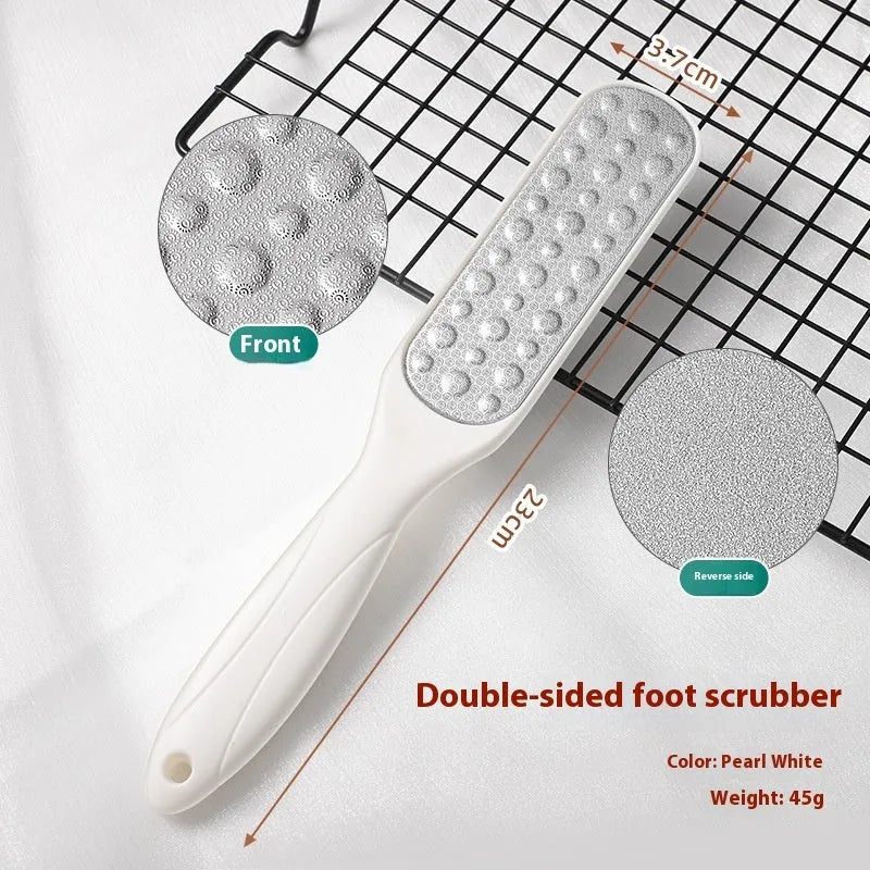 Stainless steel foot grinder with double-sided black and white sandpaper surfaces for callus removal