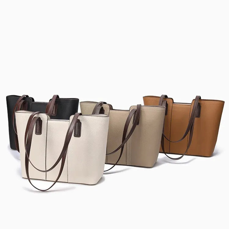 Genuine leather women's large shoulder bag in box-type design with sandwich pocket.