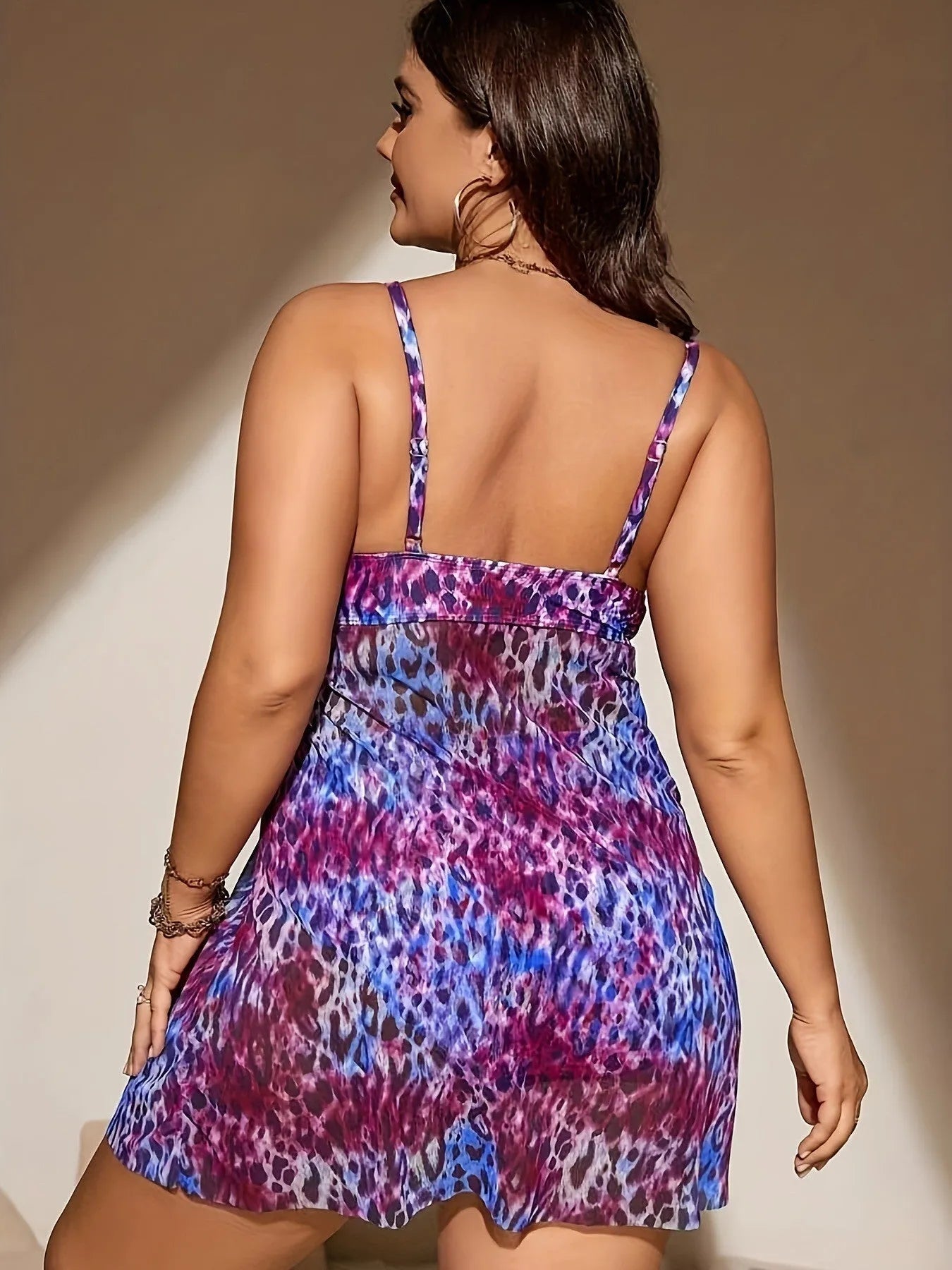 Plus size women's skirt split bikini swimsuit set in blue with wrap-front top and high-leg shorts