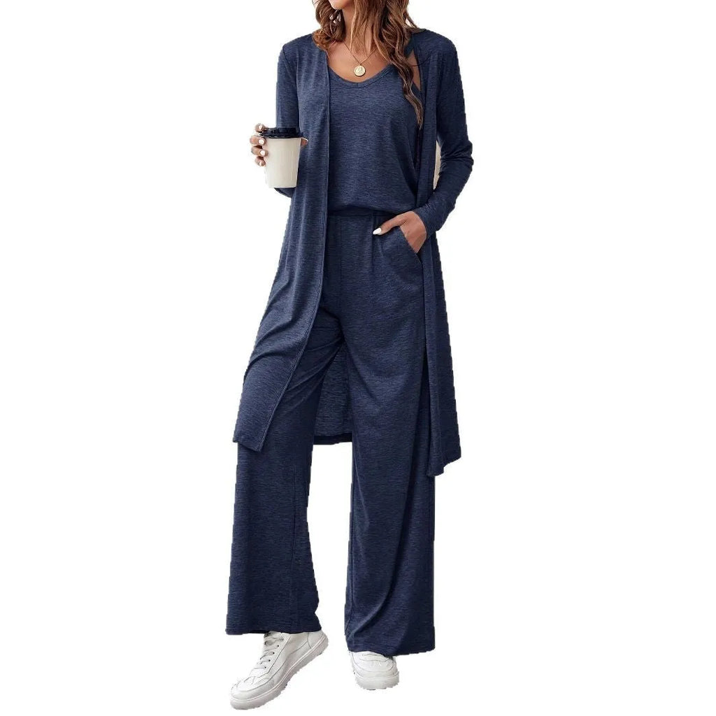 Blue women's casual suit set with cardigan, long trousers, and suspenders on a hanger.