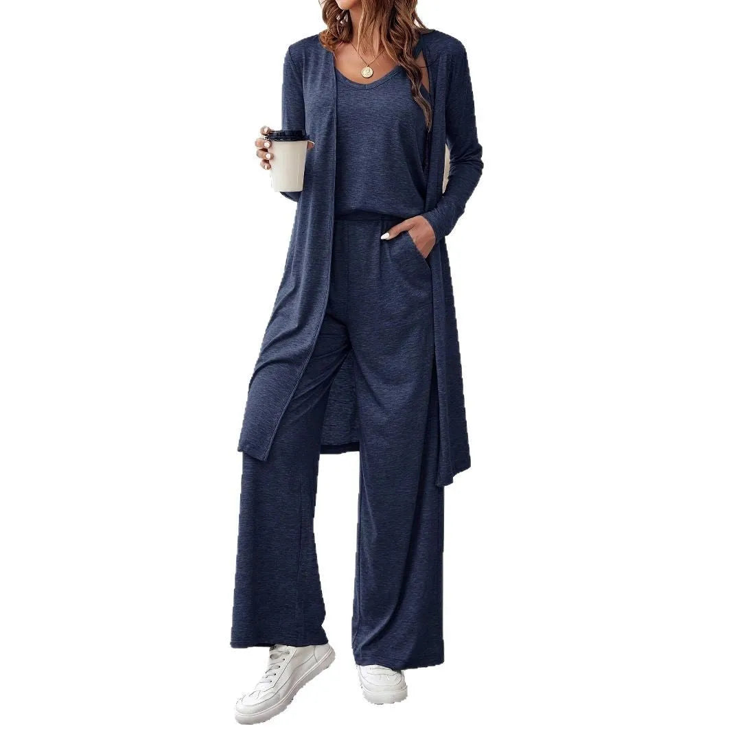 Blue women's casual suit set with cardigan, long trousers, and suspenders on a hanger.