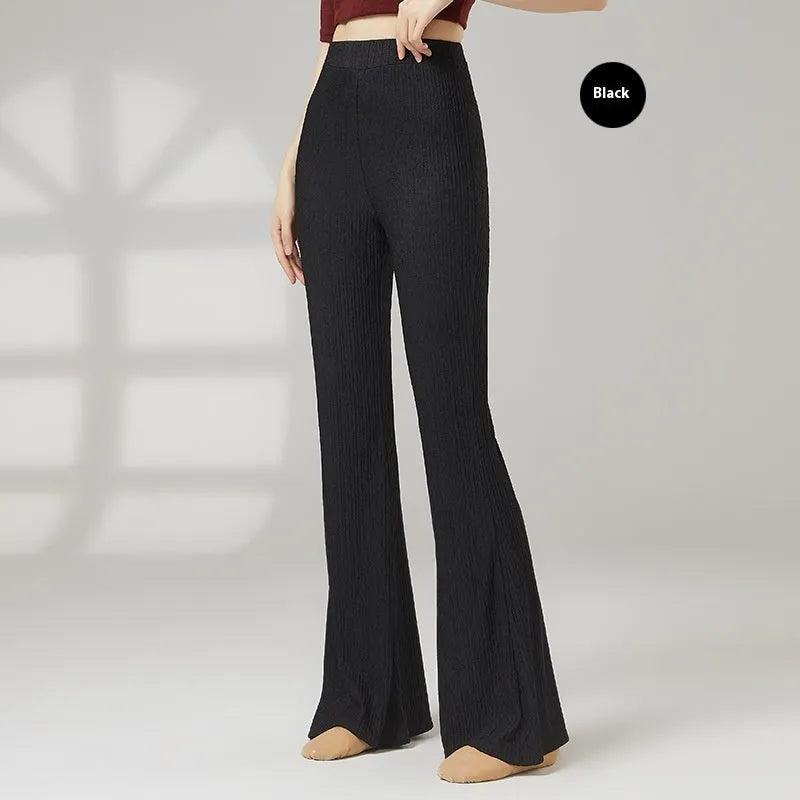 Women's solid colour dance practice trousers in polyester fabric for ballet training.