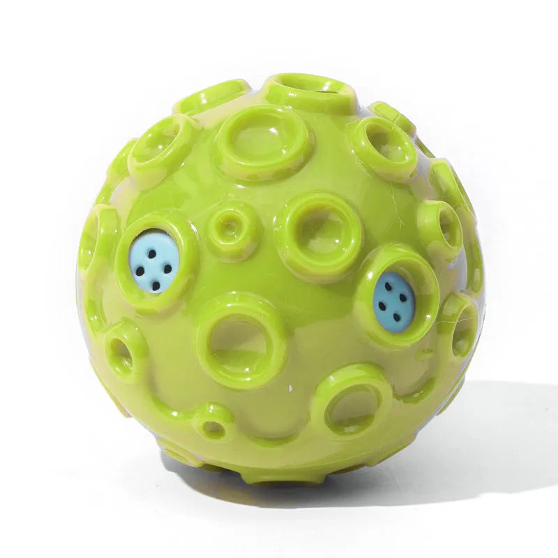 Durable natural rubber dog ball toy with textured surface and squeaker for aggressive chewers.