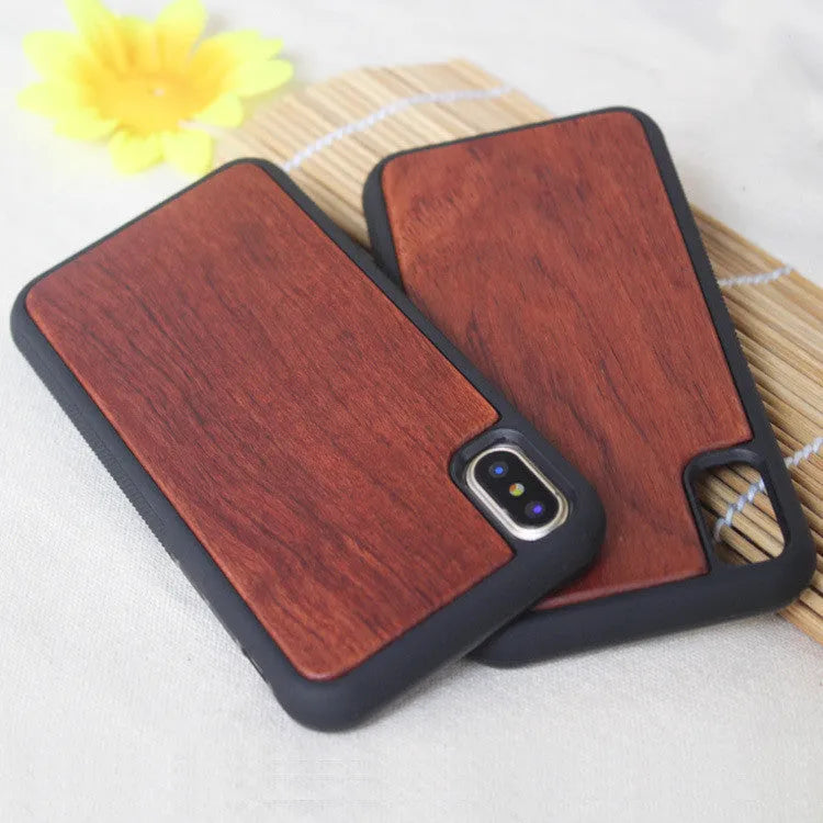 Wooden hybrid phone case with a carbonised bamboo back and black TPU bumper for iPhone.