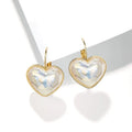 Gold-coloured clip-on earrings with natural style design for women