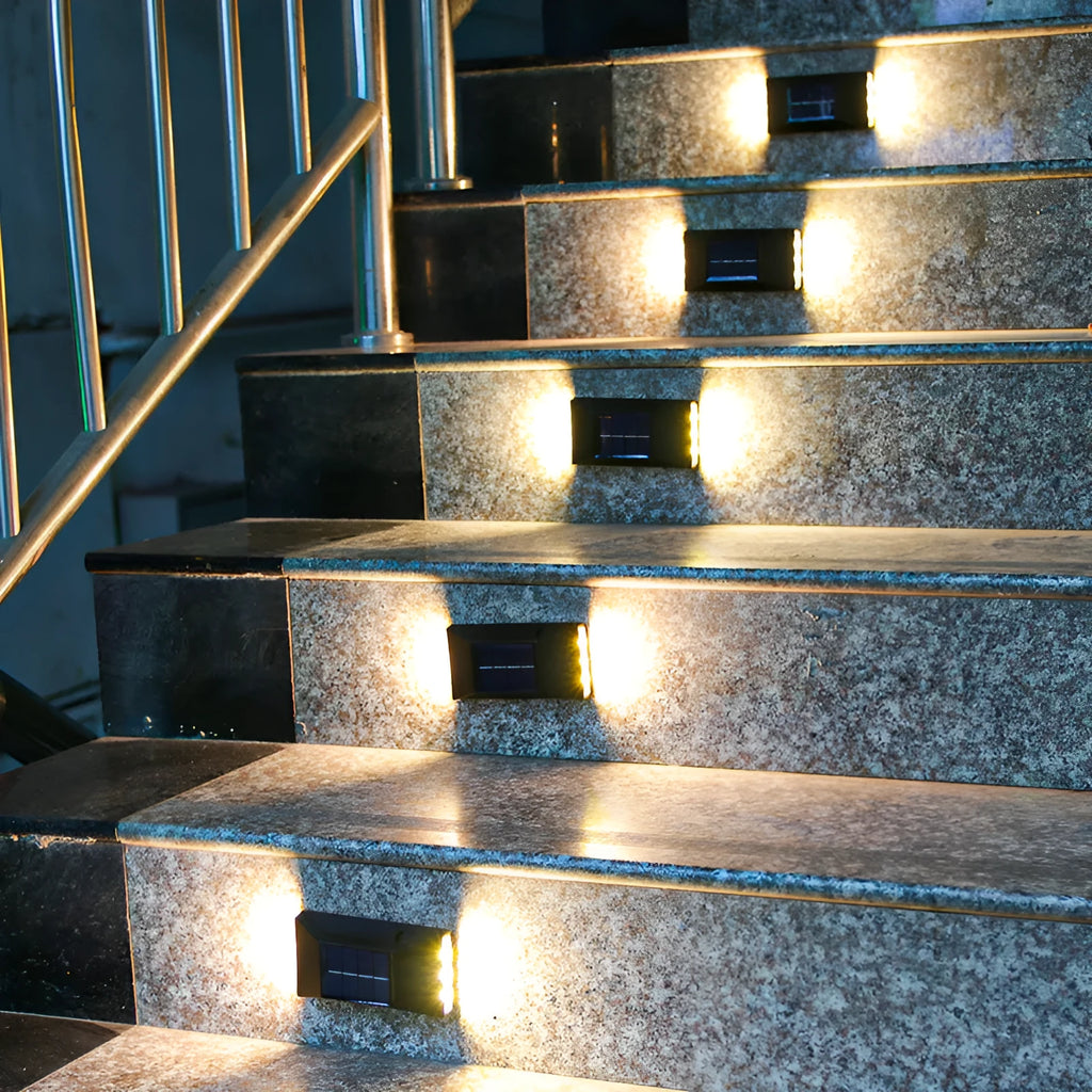 Solar garden wall light with upward and downward LED illumination for outdoor decorative lighting
