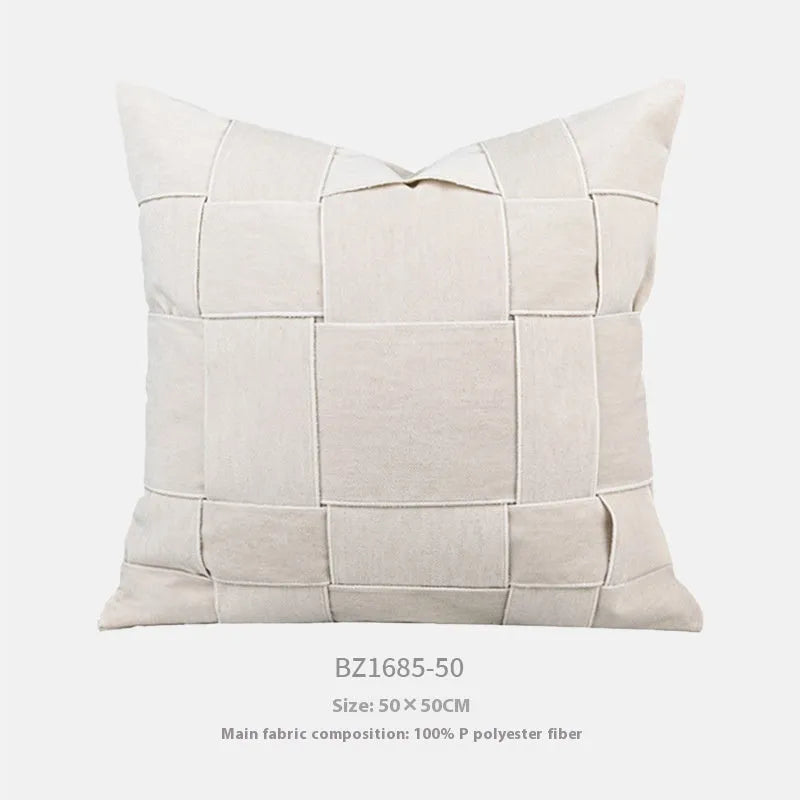 Chenille woven square cushion in beige colour on a sofa, showing its 50x50cm size and textured fabric.