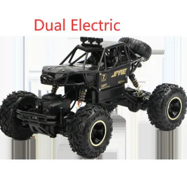 Black and silver remote control climbing cars with 2.4G wireless controller on a rough surface.