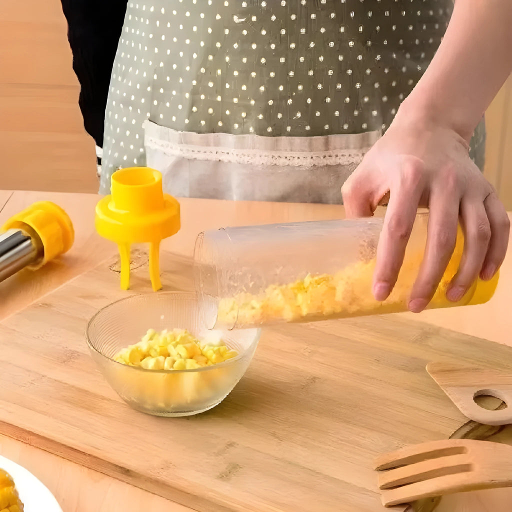 Yellow cylindrical corn stripper tool with stainless steel blades for removing kernels from corn cobs