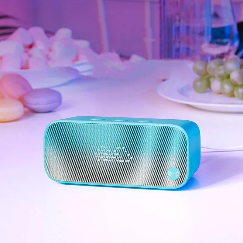 Elf Sugar Cube AI Smart WiFi Speaker in blue, green, red, or white colour.