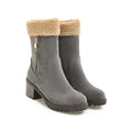 Women's snow boots with plush lining in black, grey, green, and orange colours