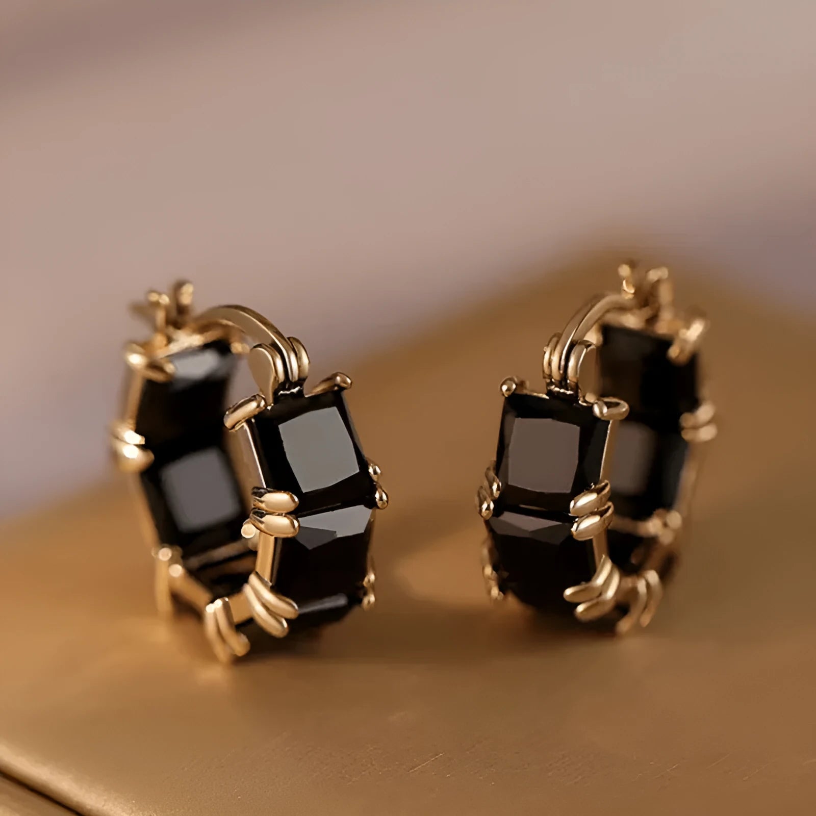 Geometric U-shaped earrings with round zircon crystals in black, pink or white with gold electroplating
