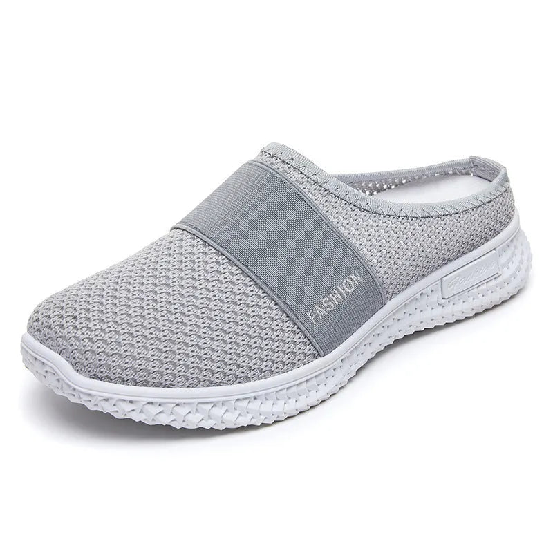 Women's breathable mesh casual shoes with hollow-out detailing and flat heel in round toe design