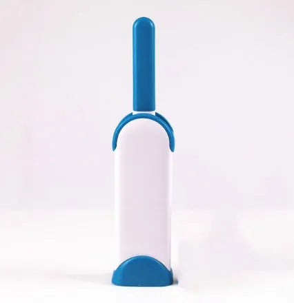 Blue reusable pet hair removal brush with self-cleaning base for furniture and clothing