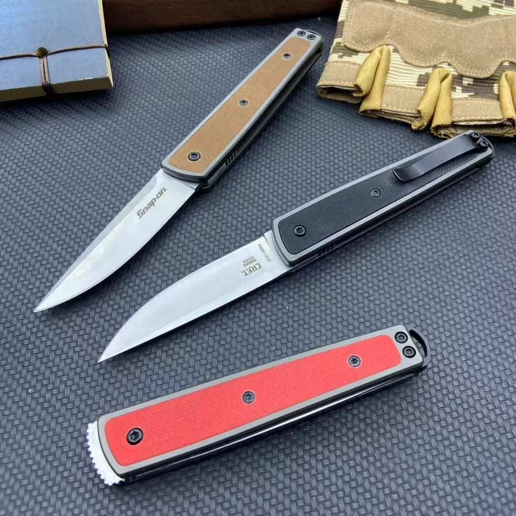 Folding fruit knife with stainless steel blade shown open, demonstrating 17cm total length
