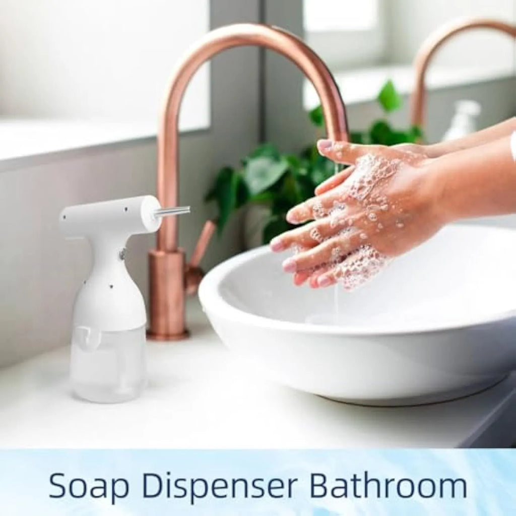 White electric foam soap dispenser with two nozzle attachments and USB charging cable