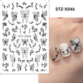 Sheet of black and silver love heart pattern nail art stickers with a plastic nail patch.
