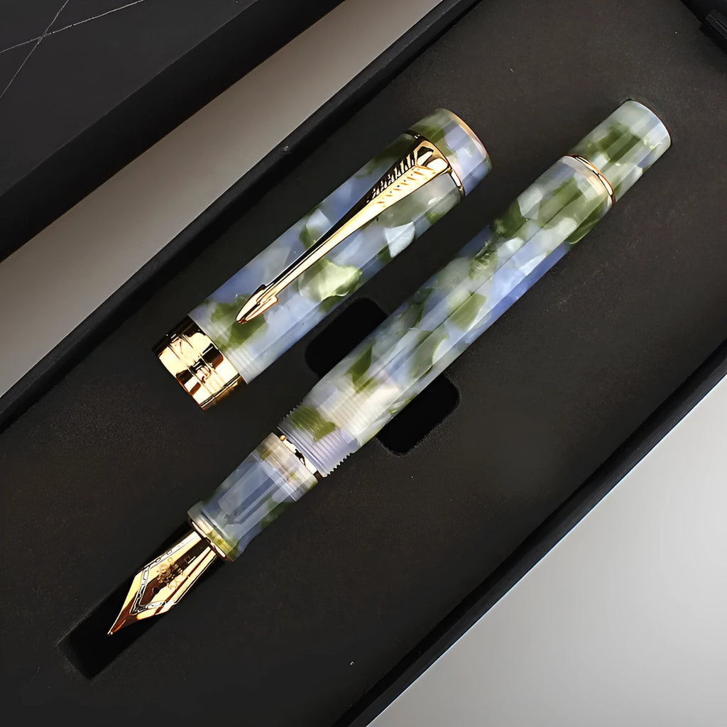 Deep bath green metal pen showing fine, medium, and broad tip size options.