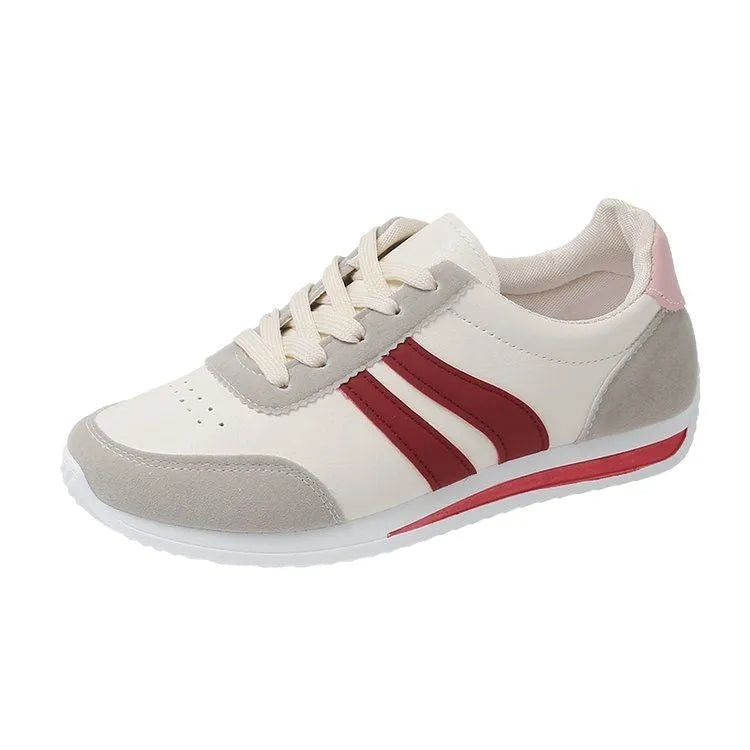Red and blue lace-up running sneakers with mesh upper and rubber soles