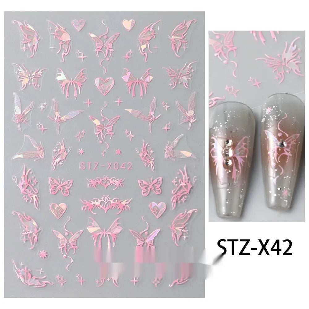 Sheet of black and silver love heart pattern nail art stickers with a plastic nail patch.