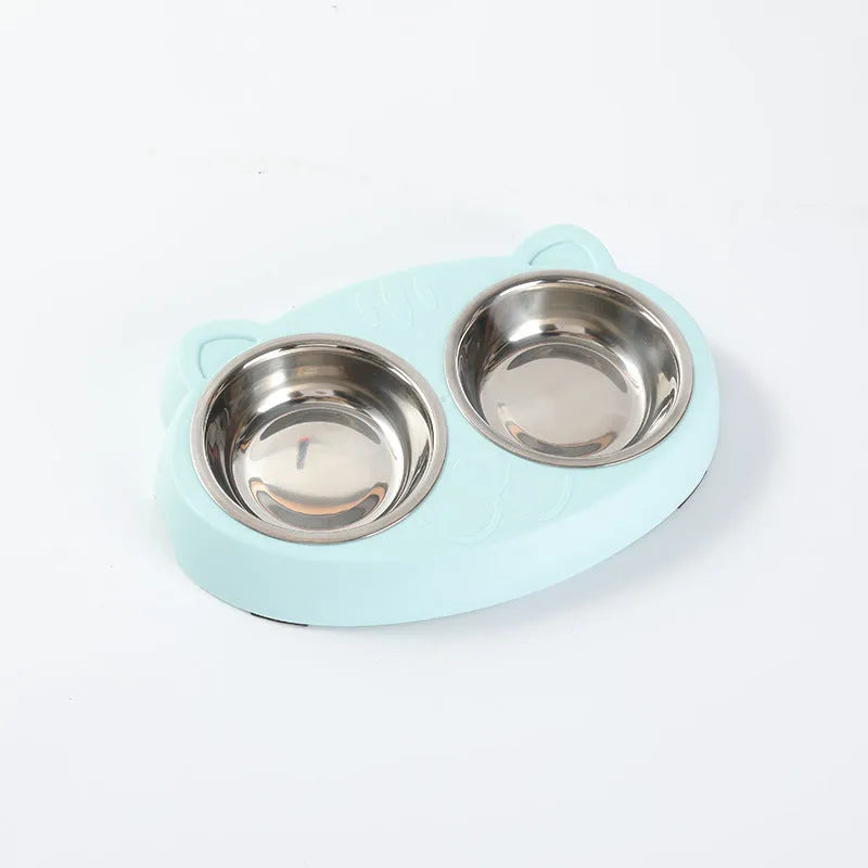 Blue macaron-styled double bowl plastic feeder tray for cats and dogs on a wooden floor.