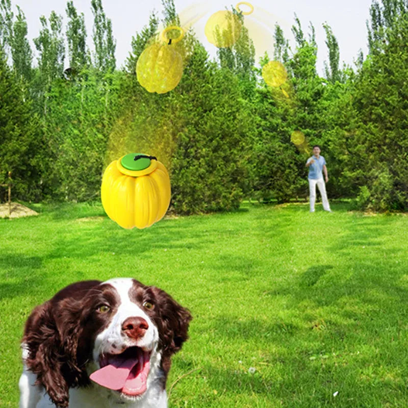 Orange plastic pumpkin-shaped dog chew toy with a squeaker, shown next to a measuring tape indicating its 68mm size.
