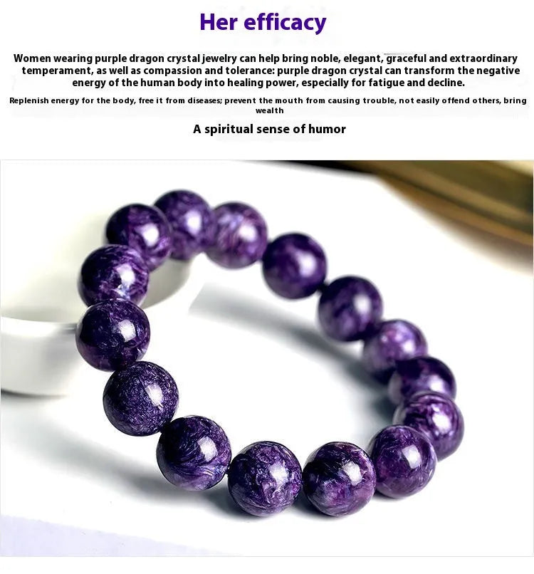 Natural transparent charoite crystal bracelet with platinum settings on wrist.