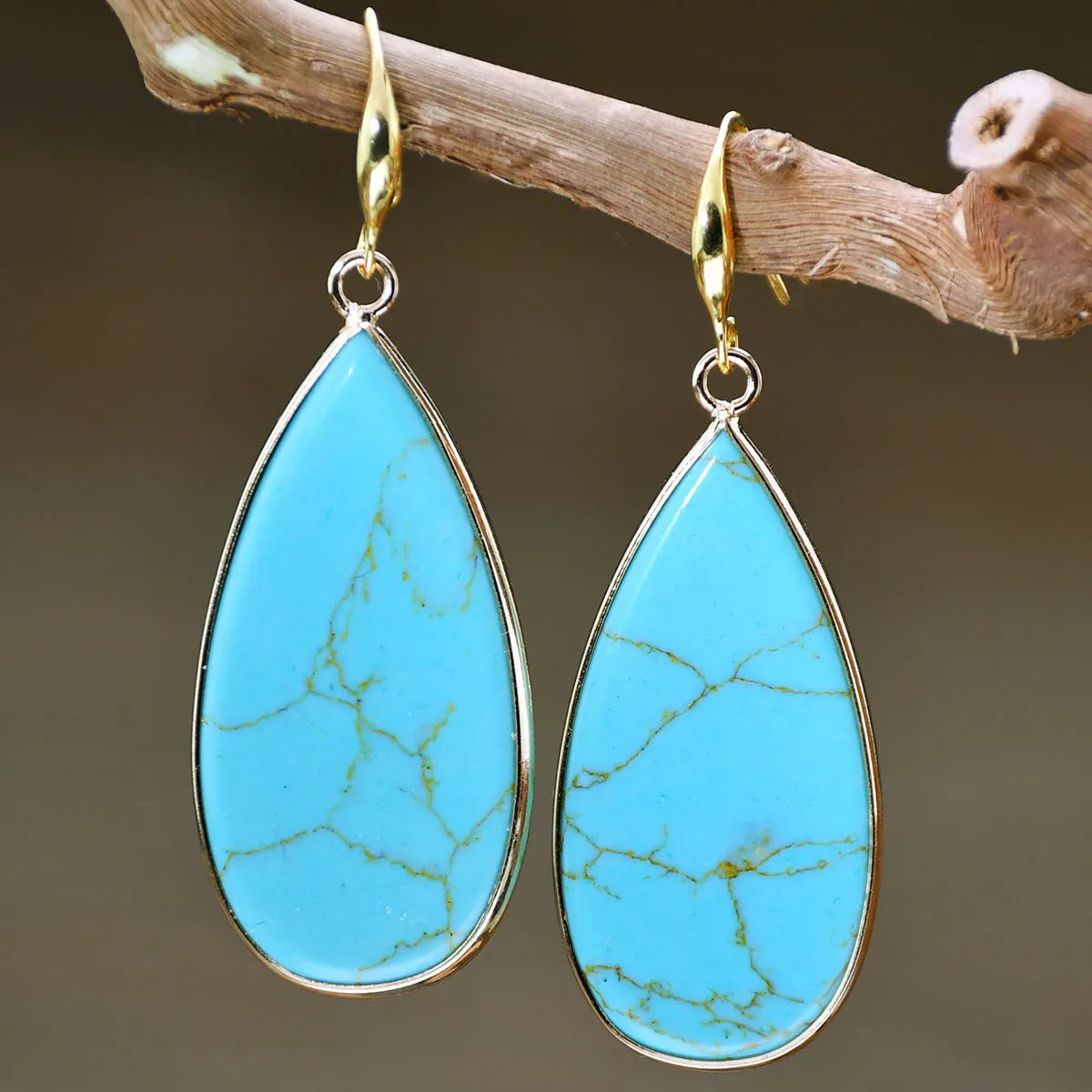Vintage handmade stone drop earrings in tigereye colour with textured surface