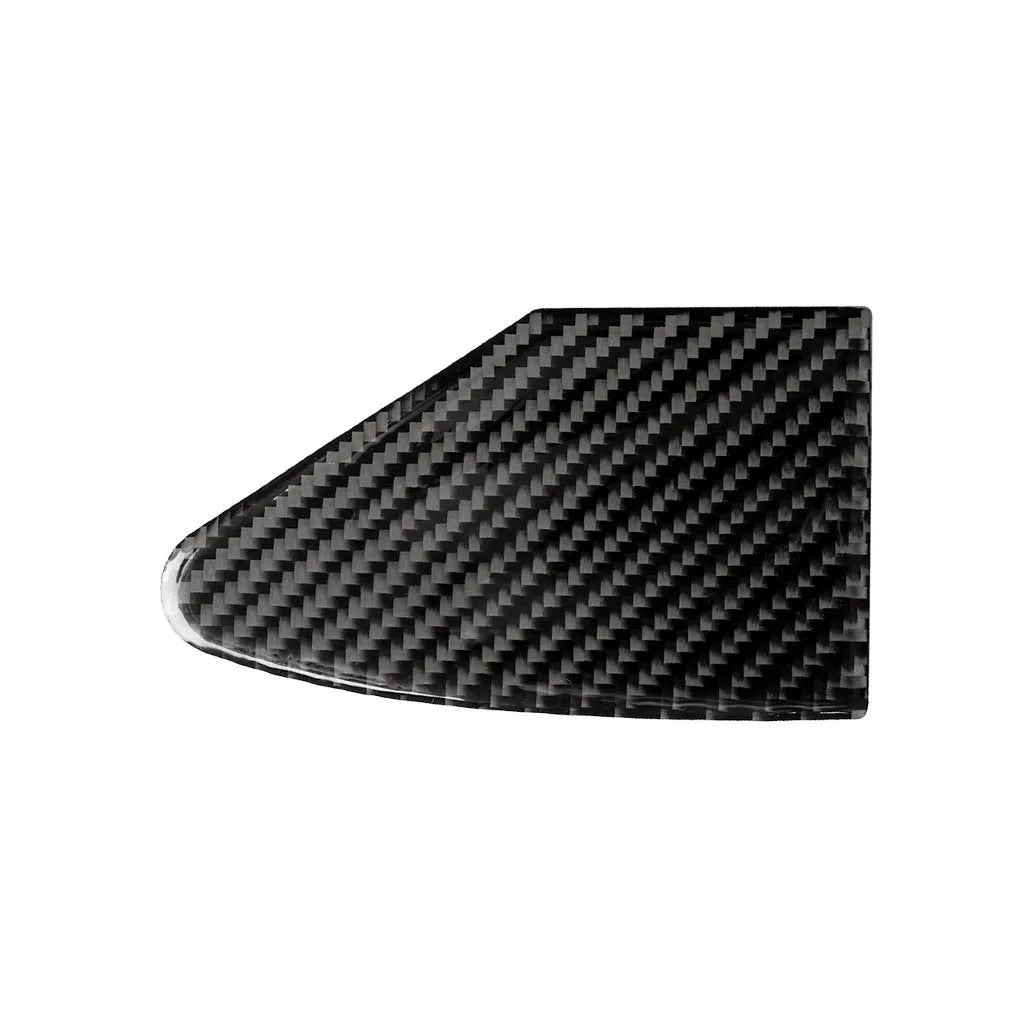 Carbon fibre decorative sticker with adhesive backing for covering a laptop or desktop USB charging port.