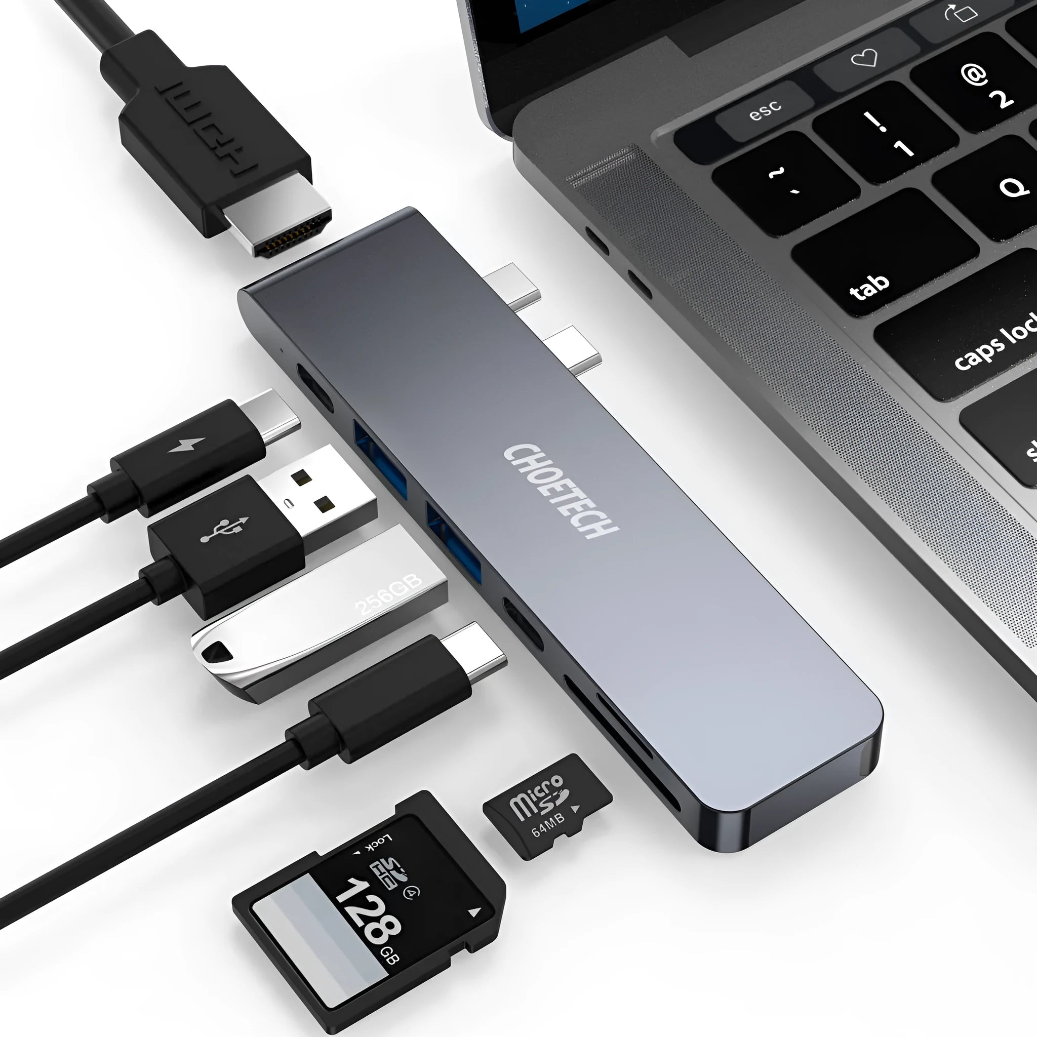 Aluminium USB-C adapter with SD card reader showing multiple ports including HDMI and USB 3.0