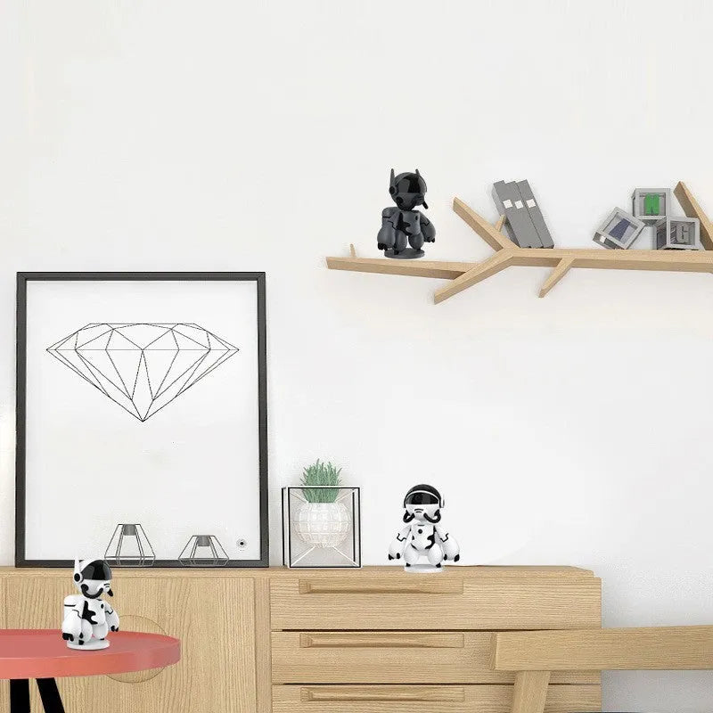 White or black Space Robot 1080P HD battery-powered indoor security camera on its detachable base.