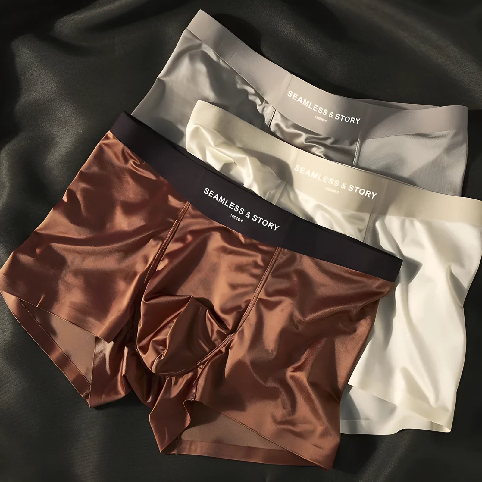 Men's ice silk underwear in satin finish showing mid-waist traceless design in coffee colour
