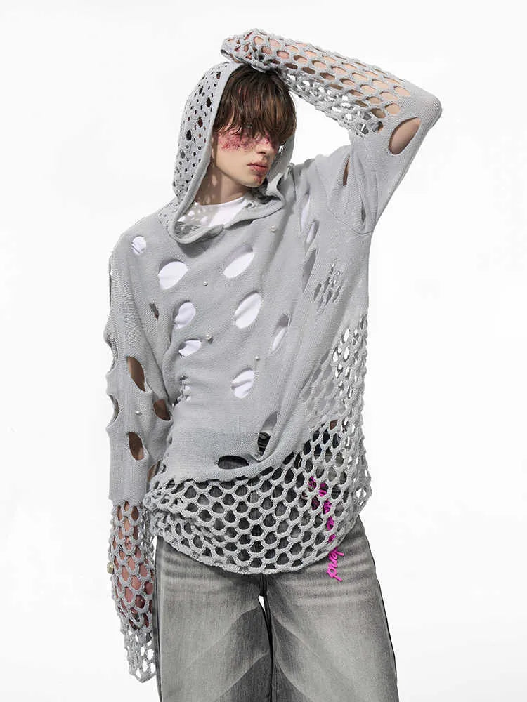 Men's black pullover hoodie with hollow-designed hood and pearl decorations on the front.