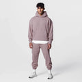 Men's cotton hoodie and jogger tracksuit set in black with pullover top and trousers for sports