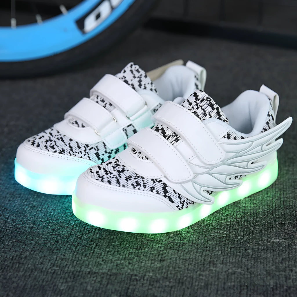 Plum red children's LED light-up sneakers with colourful flashing soles on a white background.