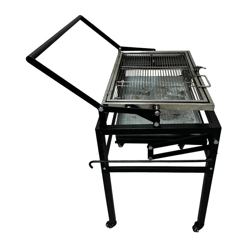 Large foldable charcoal barbecue grill stove shown in outdoor courtyard setting